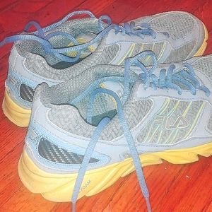 Fila gray sneakers with blue trim and yellow soles